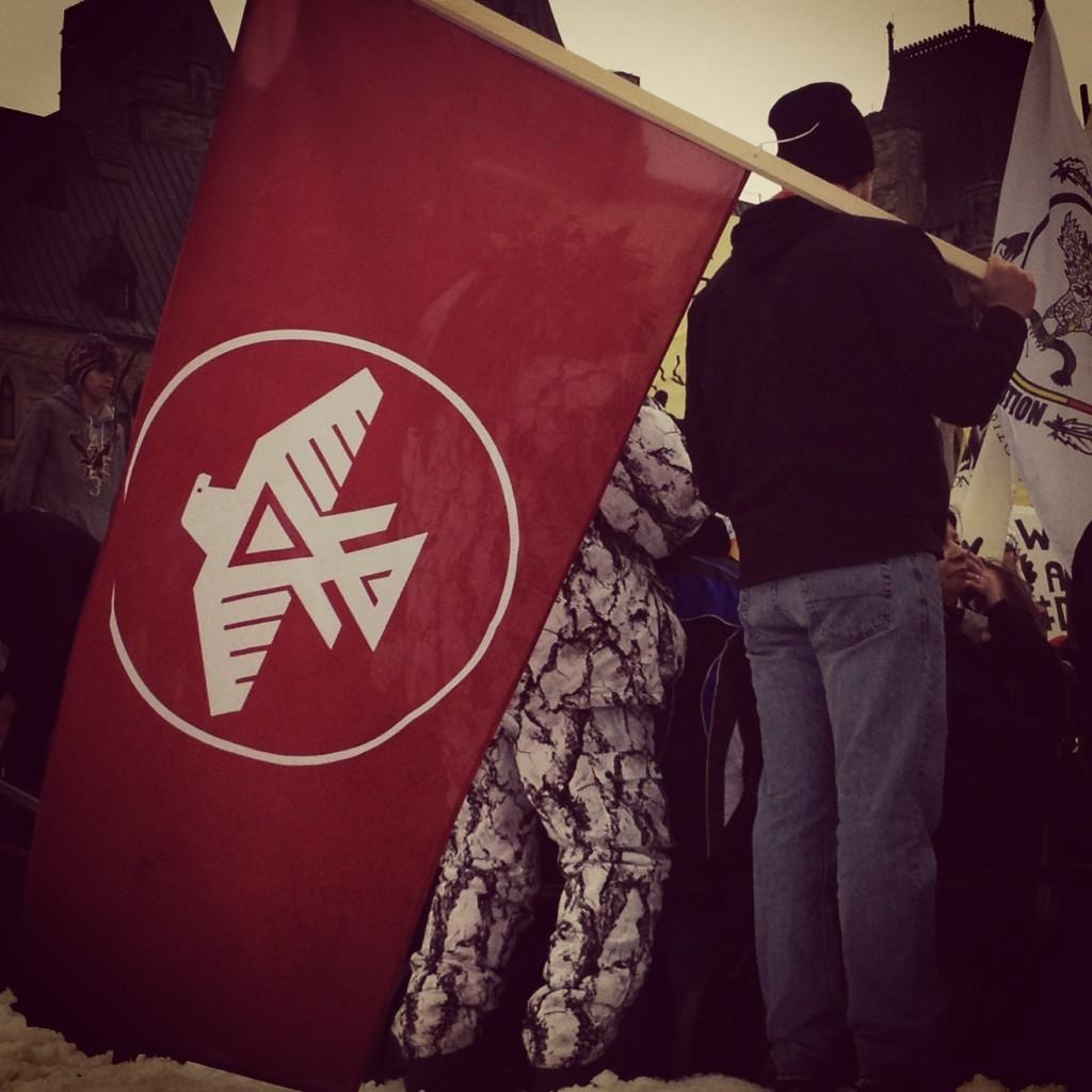 Jason with Anishinabek Nation Flag